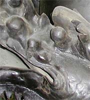 Bronze column: detail of dragon head