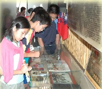 We look over information in the museum carefully.