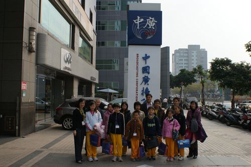 Our team taking a photo in front of BCC HQ Songjian Building on  Songjian Road