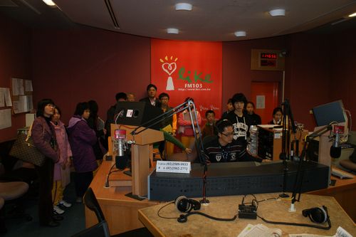 Students visiting live at i Like Radio broadcast
