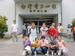 Taking Pictures in Front of TaiPower HePing Construction Building