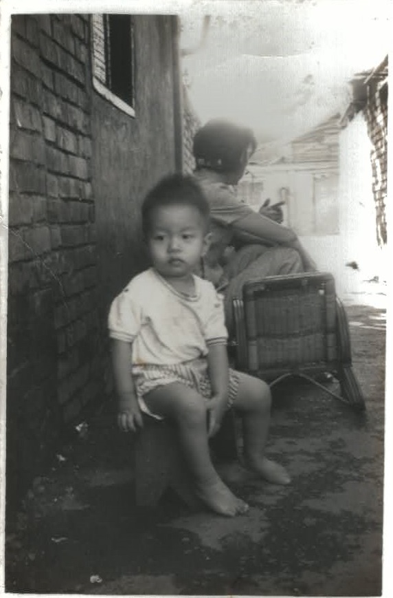 Weixuan’s father at the Village in his childhood